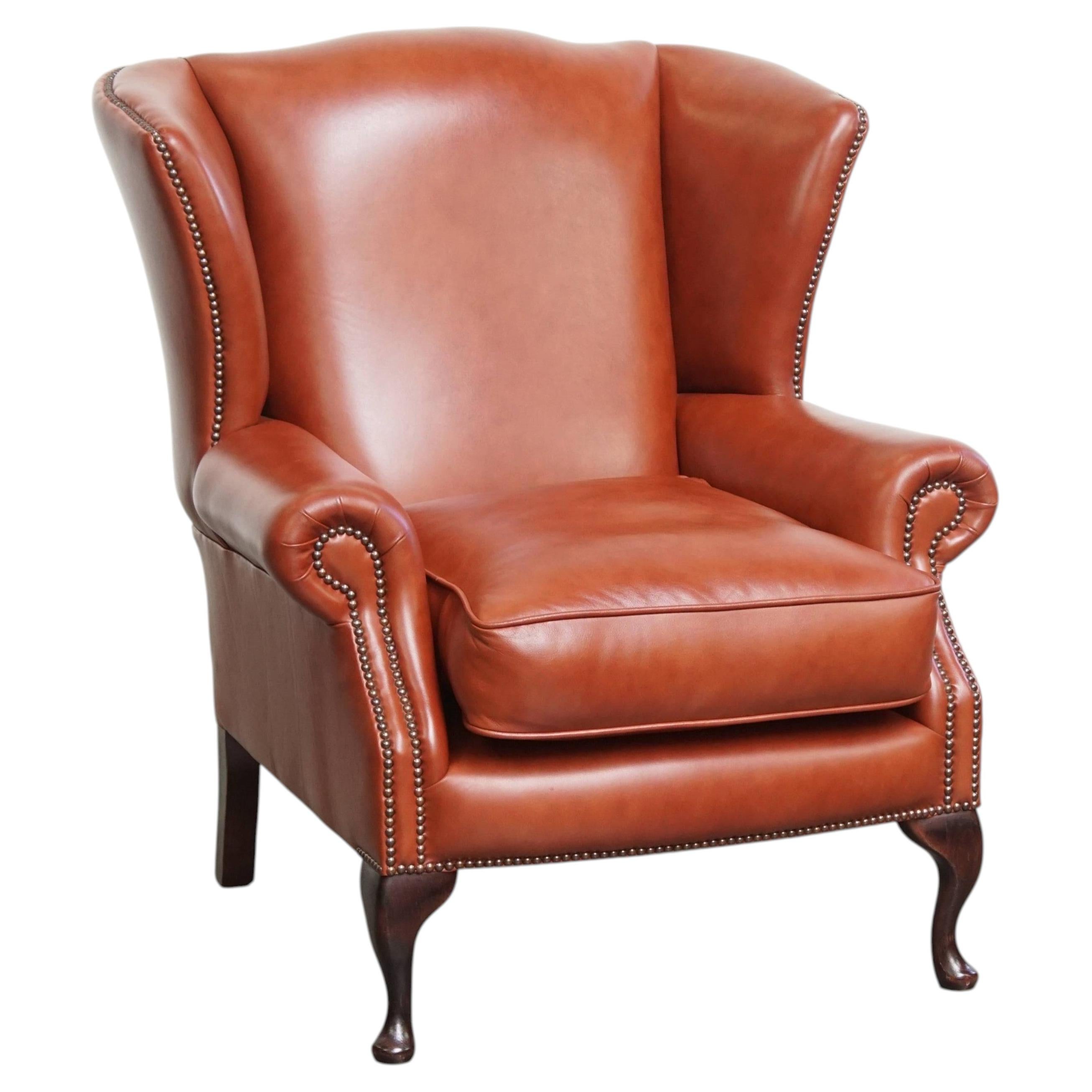 Elegant smooth English cowhide leather Chesterfield wingback armchair
