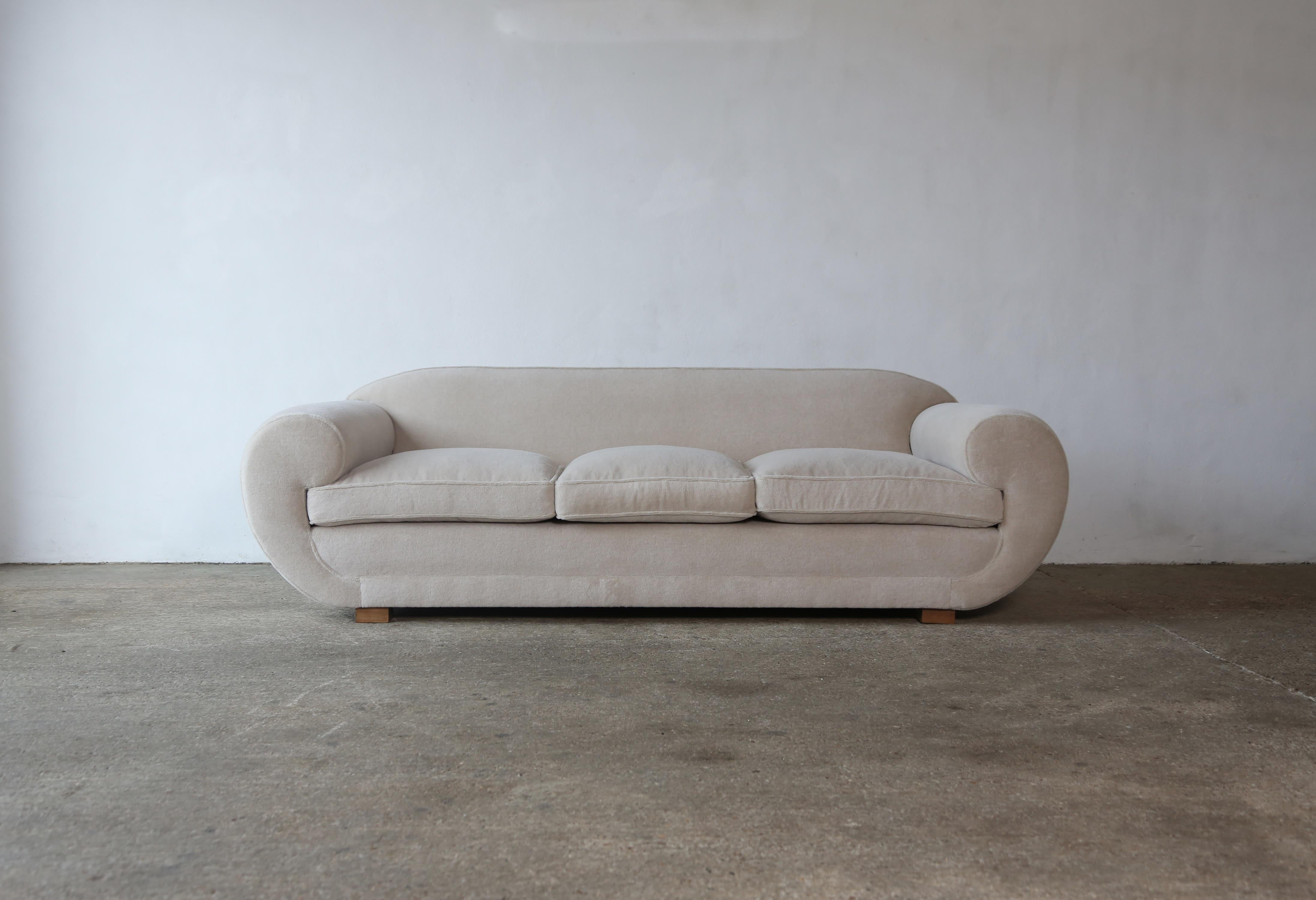 A superb Art Deco style sofa, upholstered in pure Alpaca. High quality hand-made beech frames and newly upholstered in a soft, ivory, premium 100% alpaca fabric. Fast shipping worldwide.



