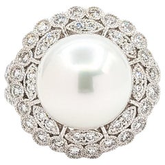 Eleganter Ring aus Platin mit Südseeperlen und Diamanten mit Fadenlauf