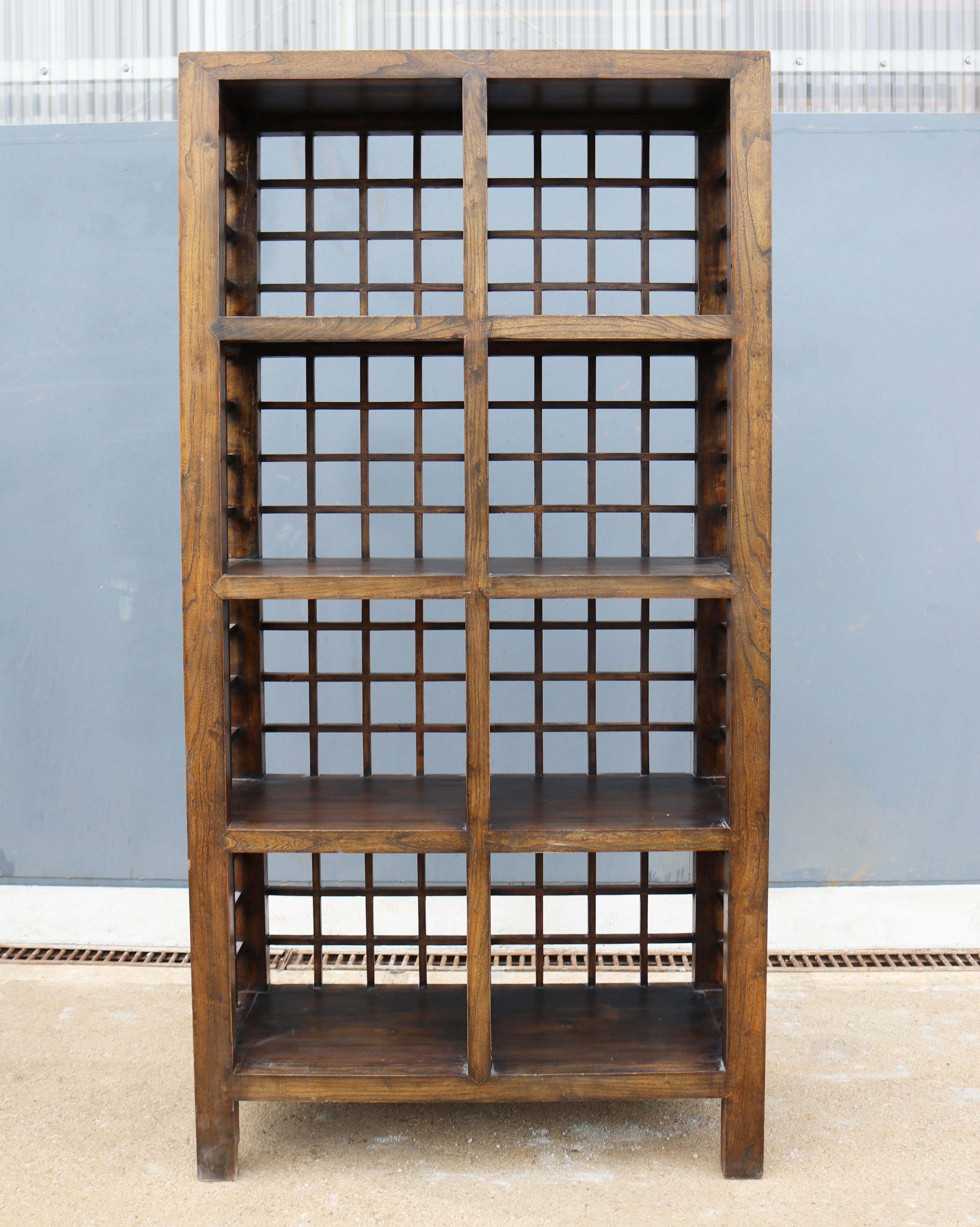 Elegant Spanish elm 4-shelf grid bookcase.