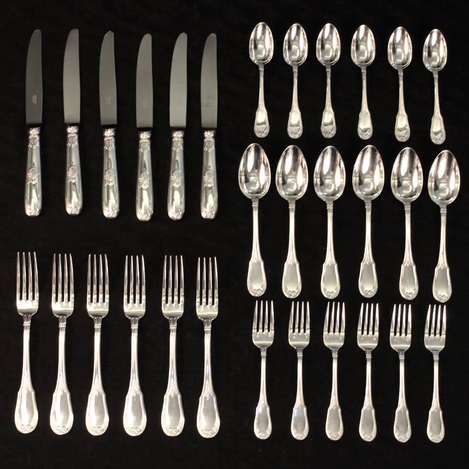 Circa 1960s, .950 standard fineness silver, by Ercuis, Paris, France.  Complete for six, this sterling flatware set in the sophisticated Empire pattern by Ercuis of Paris is timelessly designed in the Napoleonic taste. The detail is meticulous and