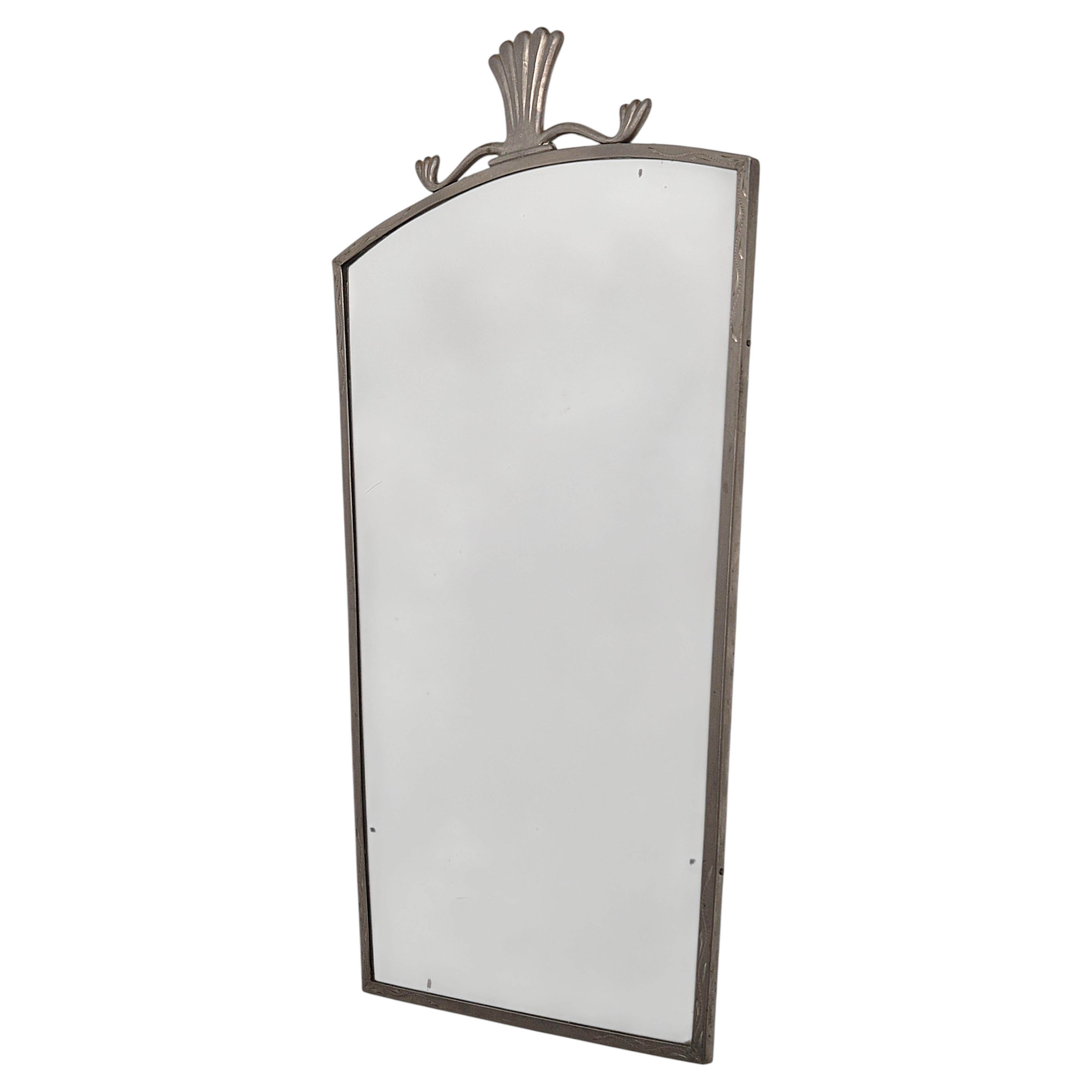 Elegant Swedish Grace pewter mirror with original glass, nice patina.