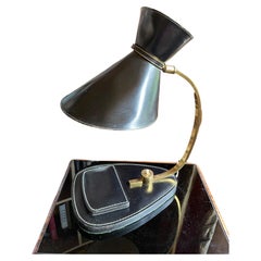 Elegant table lamp. France 1950s. Jacques Adnet. Leather, brass.