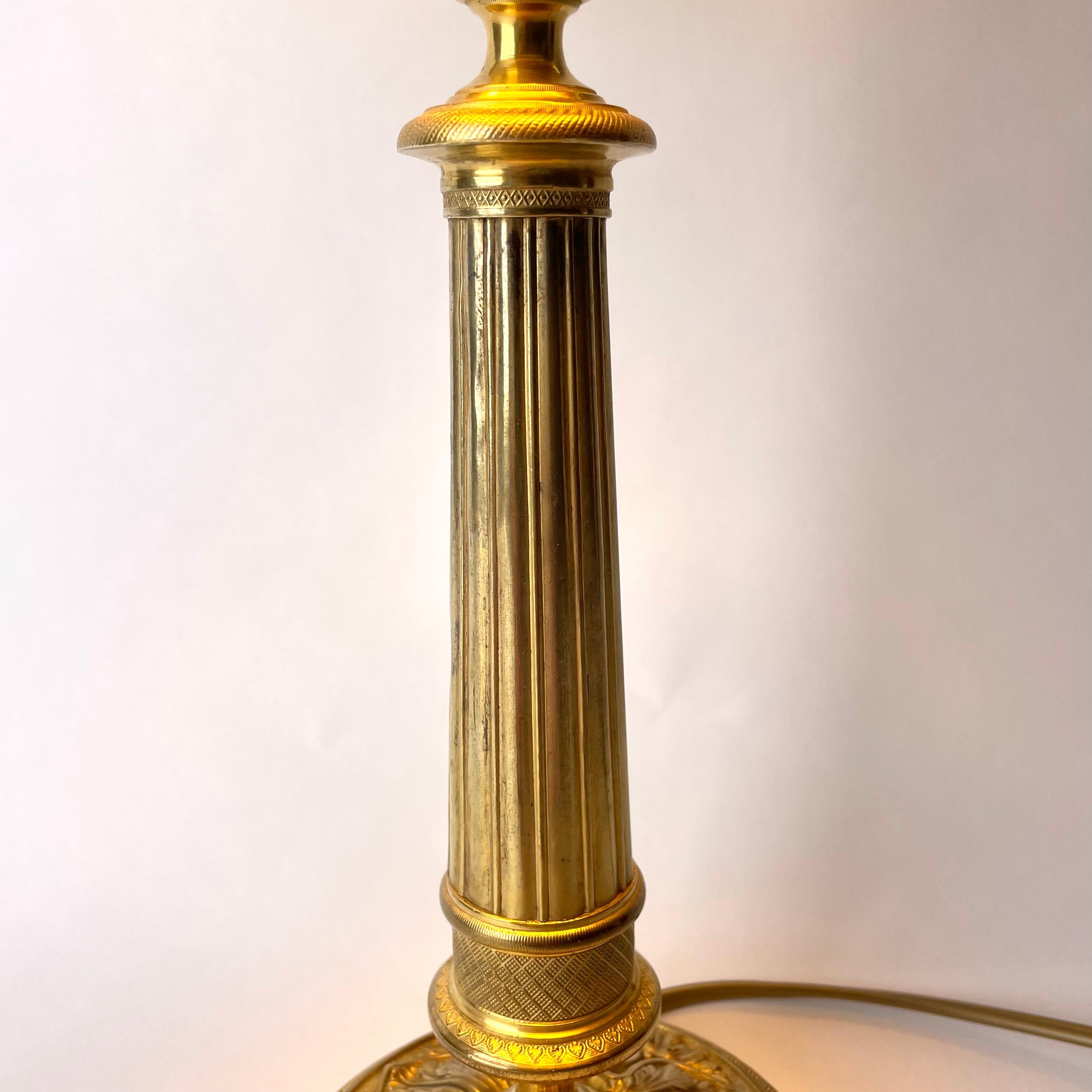 Early 19th Century Elegant Table Lamp in bronze. Originally an Empire candlestick from the 1820s For Sale