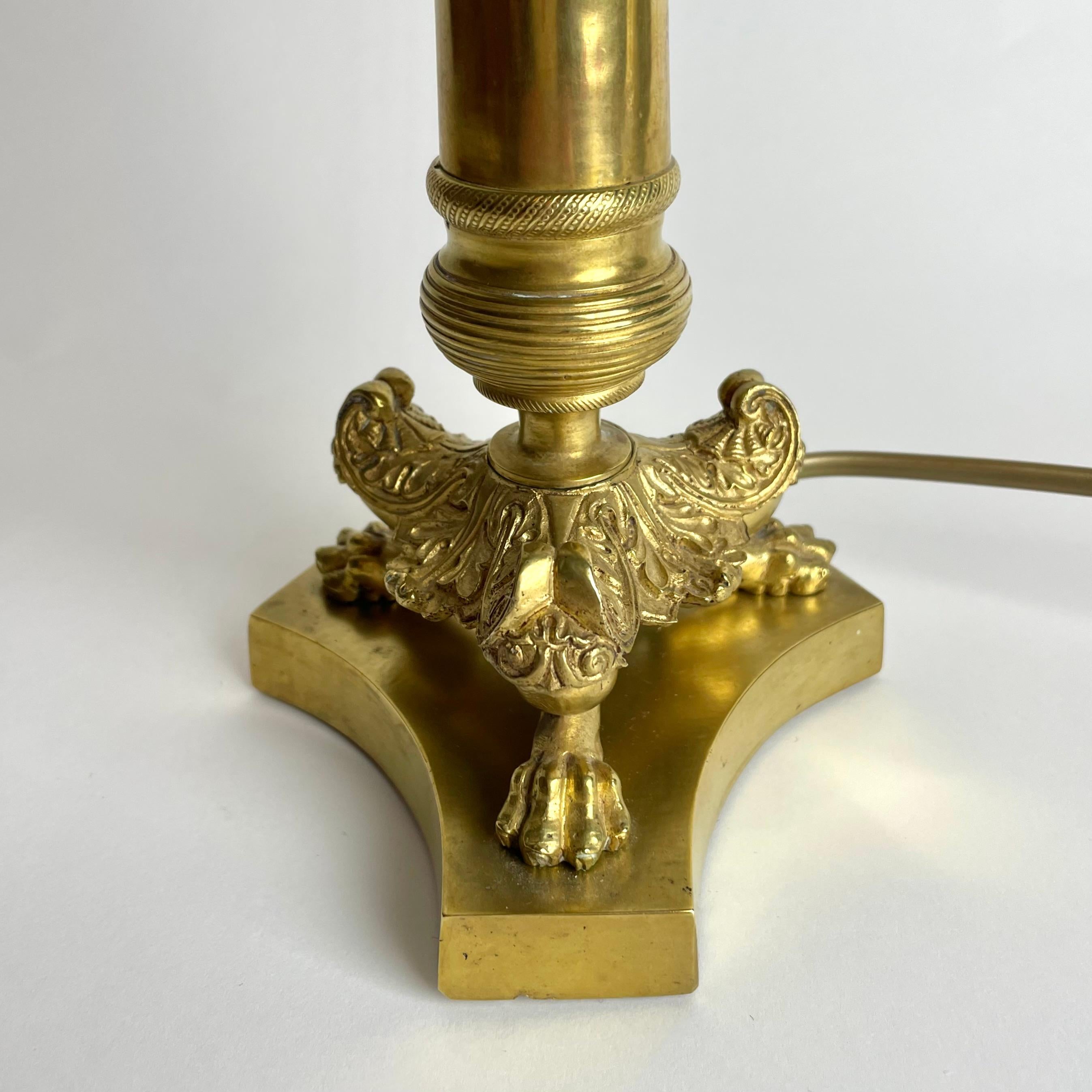 Bronze Elegant Table Lamp in bronze. Originally an Empire candlestick from the 1820s For Sale