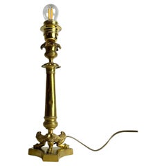 Elegant Table Lamp in bronze. Originally an Empire candlestick from the 1820s
