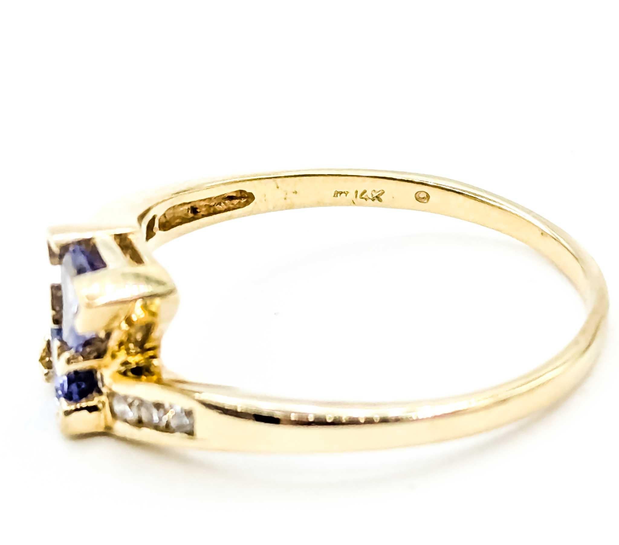 Elegant anneau de contournement en or jaune 14k avec tanzanite et diamant Pour femmes en vente