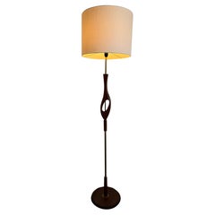 Elegant teak floor lamp