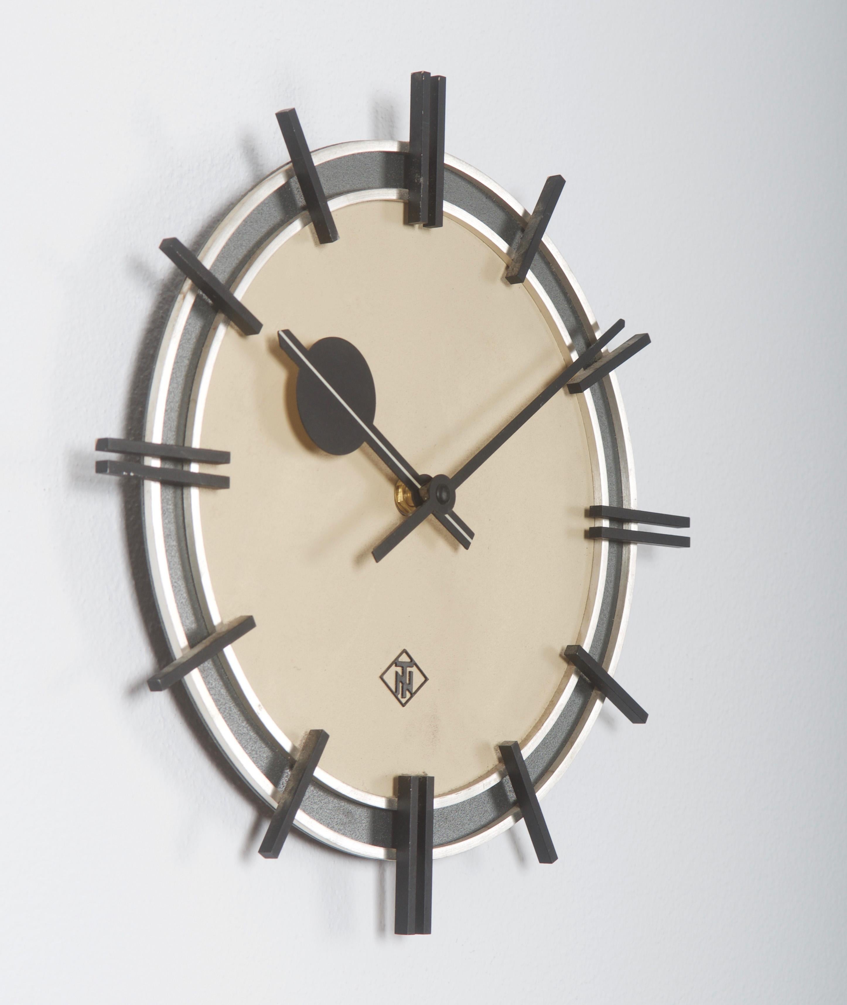 Brass/steel body, painted clock face and steel clock hands made by TN Telenorma in the late 1960s.
Formerly a station or factory slave clock, it is now fitted with a modern quartz movement with a battery.
 