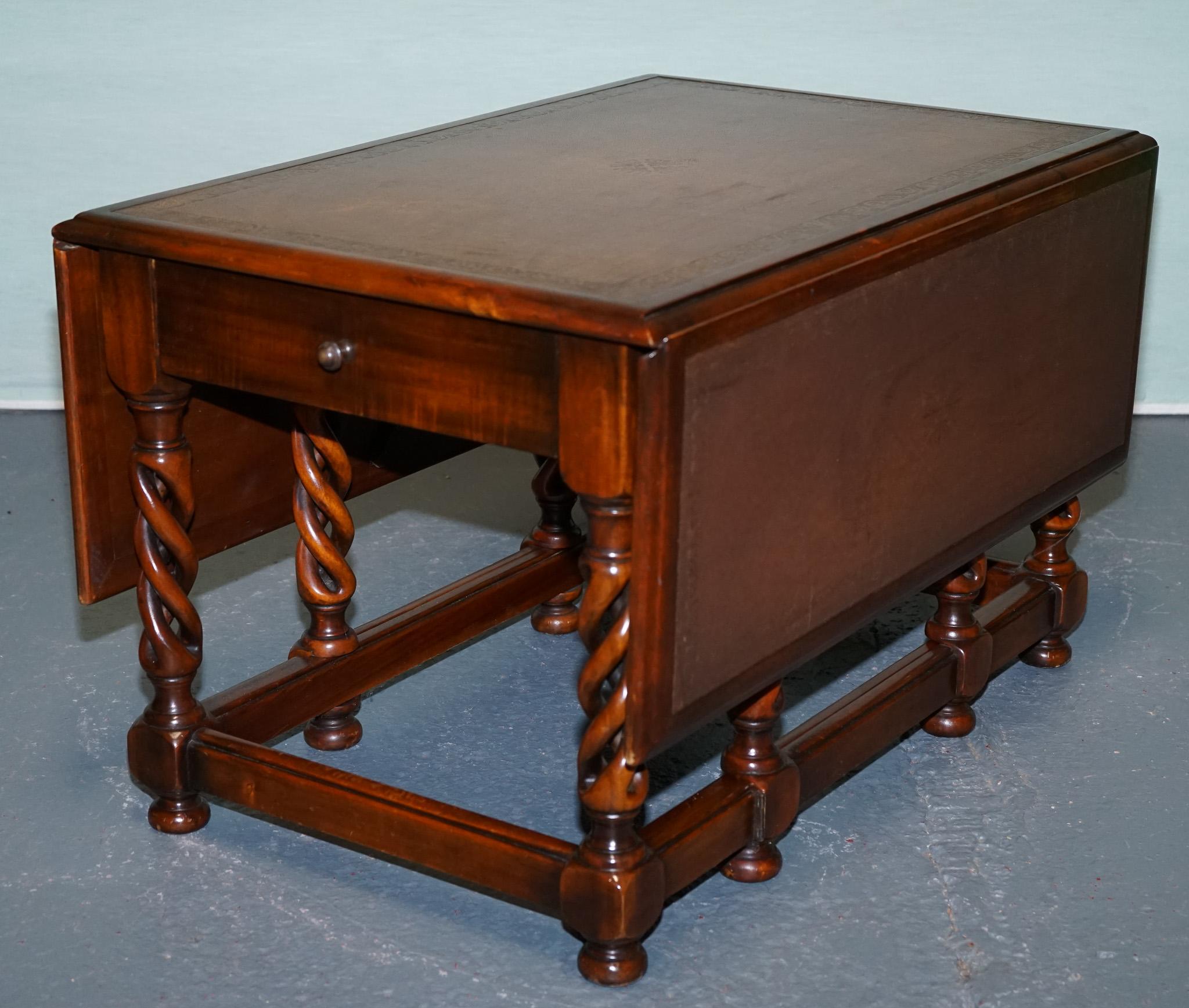 
Antiques of London



An exquisite Theodore Alexander drop-leaf occasional table, showcasing meticulous craftsmanship in the brand’s signature style. The piece features a rich leather‑inset top, beautifully framed by toggle‑leaf flaps, set upon