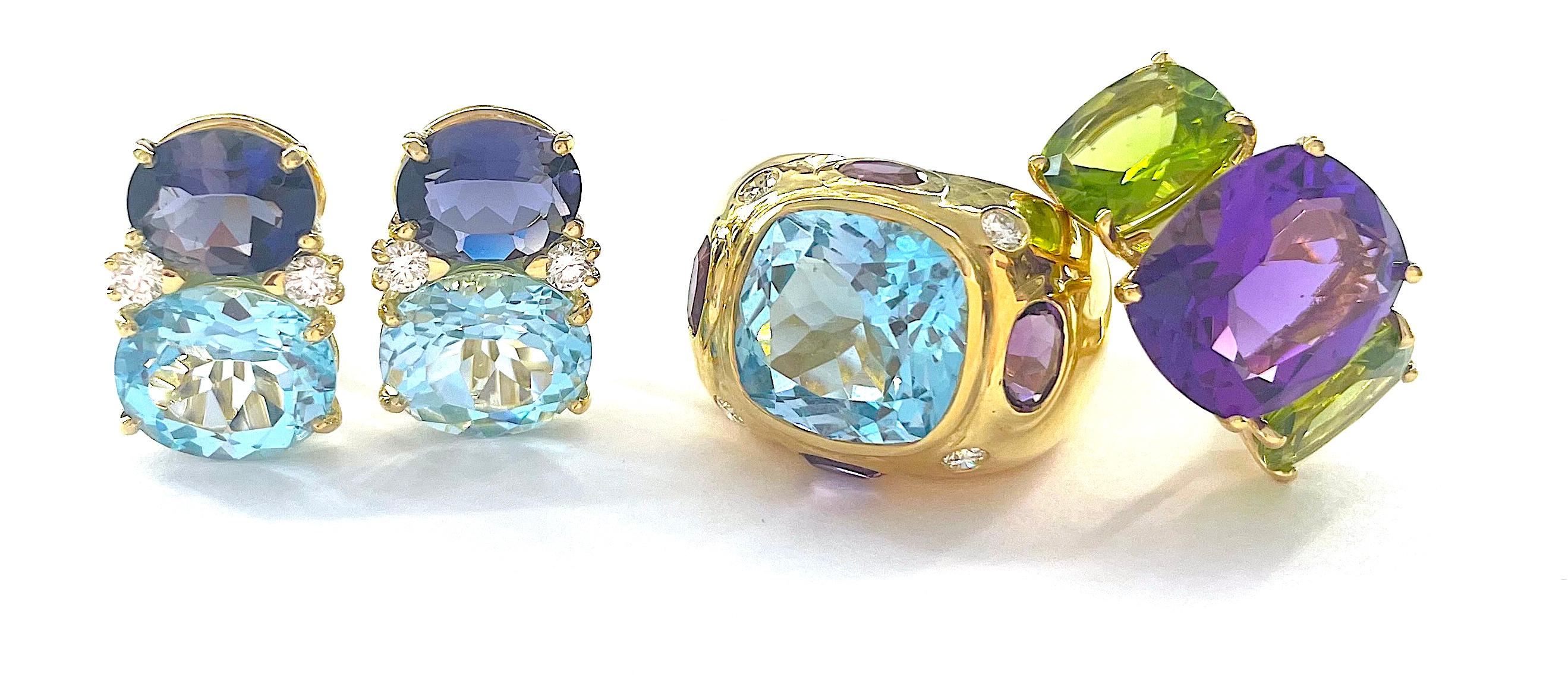 Elegante Anillo de Tres Piedras de Amatista y Peridoto Moderno en venta