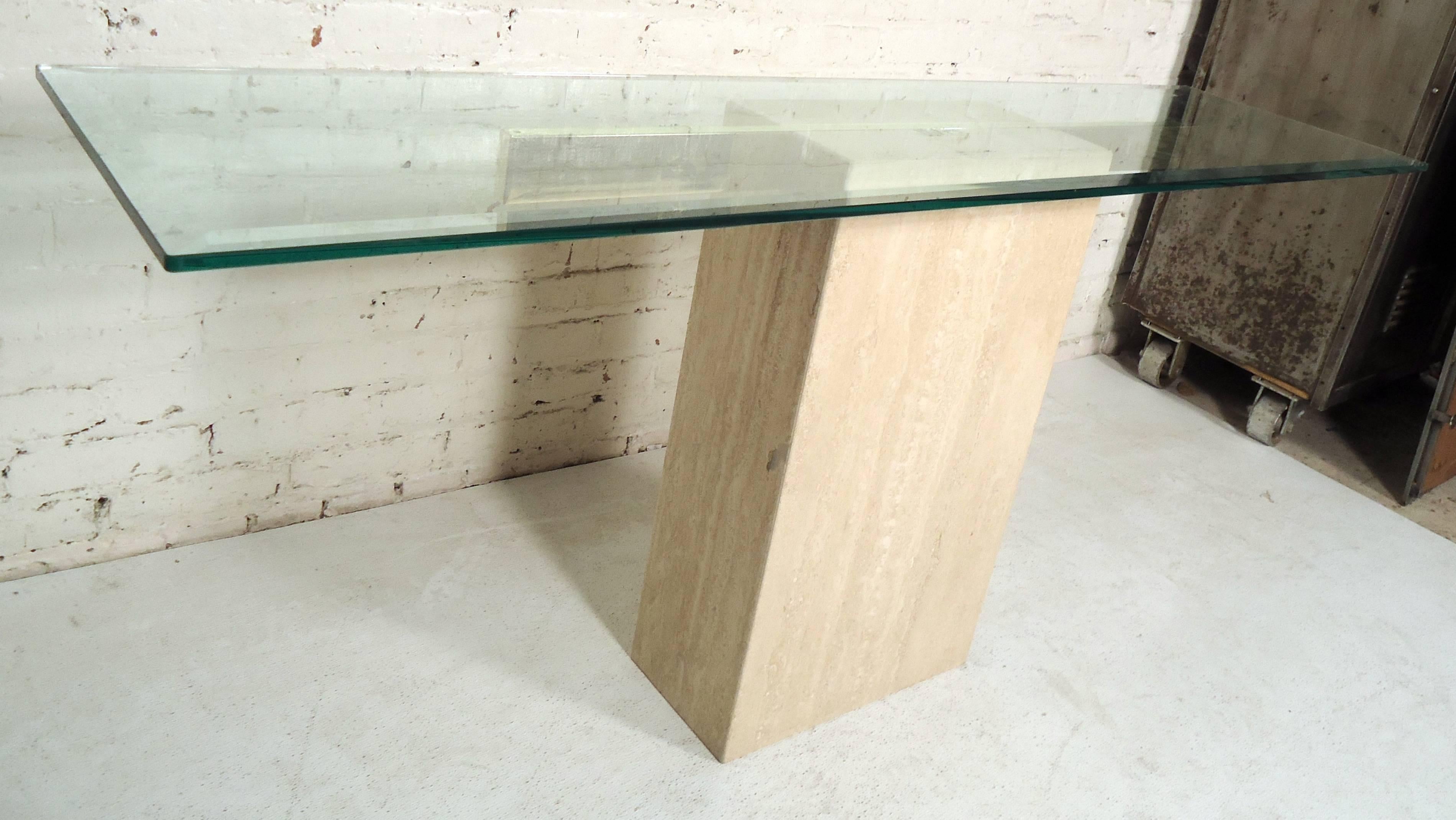 Modern travertine marble base with long glass top console table.

(Please confirm item location - NY or NJ - with dealer).

 