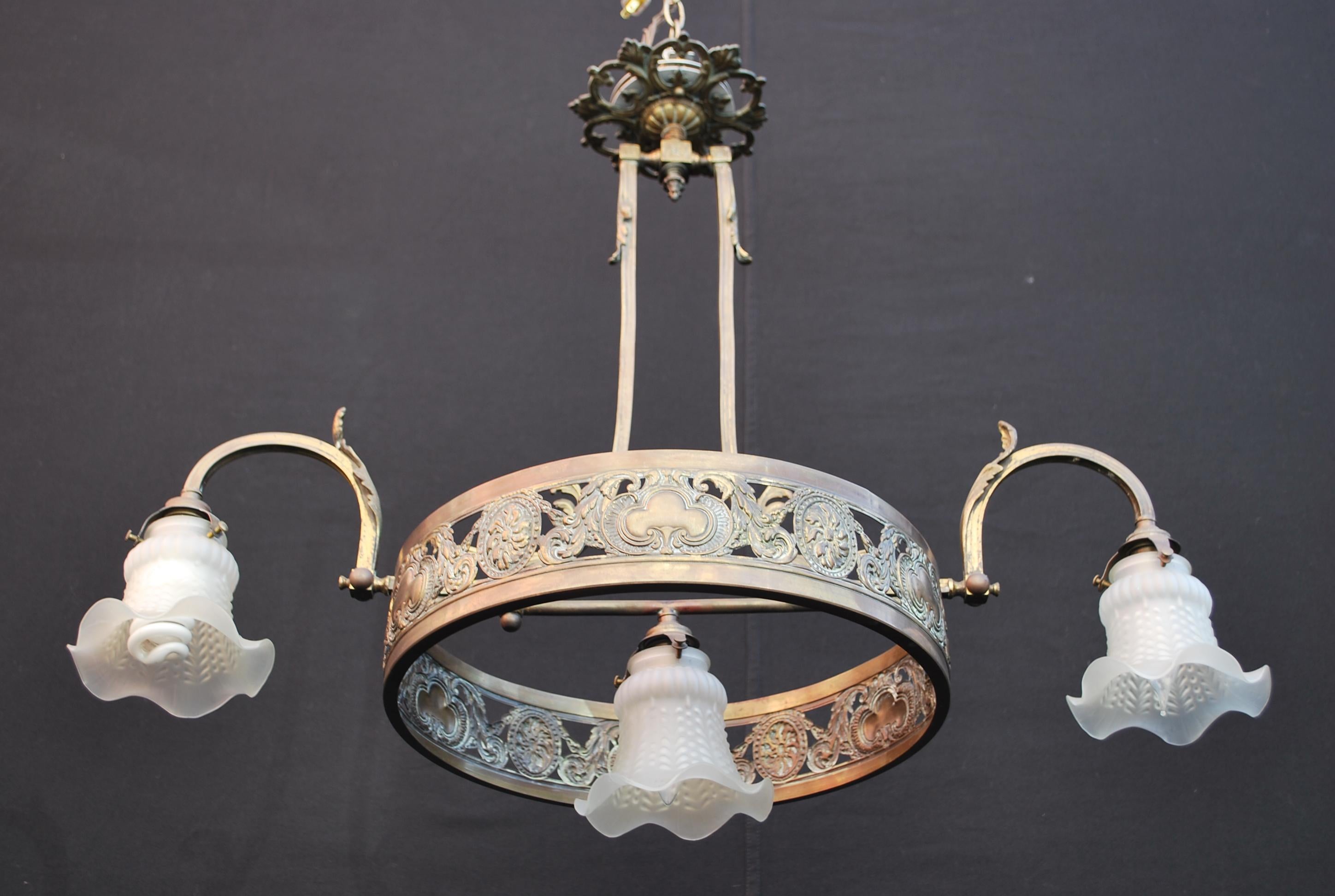 A beautiful turn of the century French chandelier, It will be perfect for a pool table, however it can be put over a kitchen island or a living room, this light can go almost anywhere, victorian style, French style, ect, the patina is allot nicer in