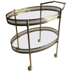 Elegant Two-Tier Brass Oval Bar Cart Elegant Two-Tier Brass Oval Bar Cart