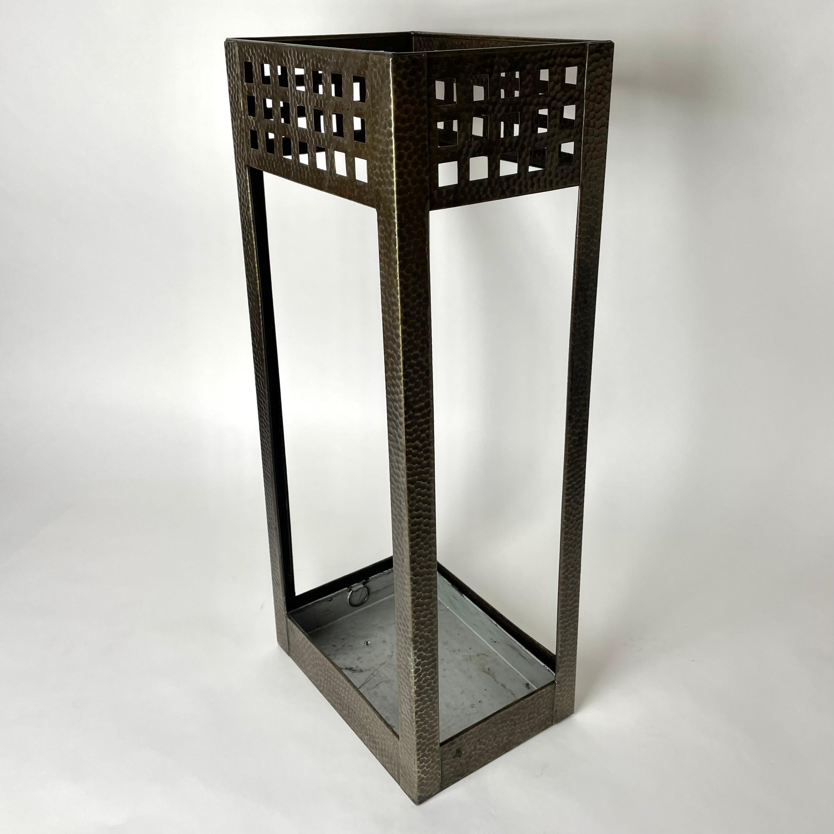 Elegant Umbrella Stand in hammered iron from the early 20th Century. In the style of Josef Hoffmann and Charles Rennie Mackintosh. In very period design from early 20th Century.

Wear consistent with age and use 
