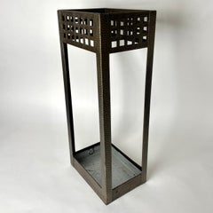 Elegant Umbrella Stand in hammered iron from the early 20th Century