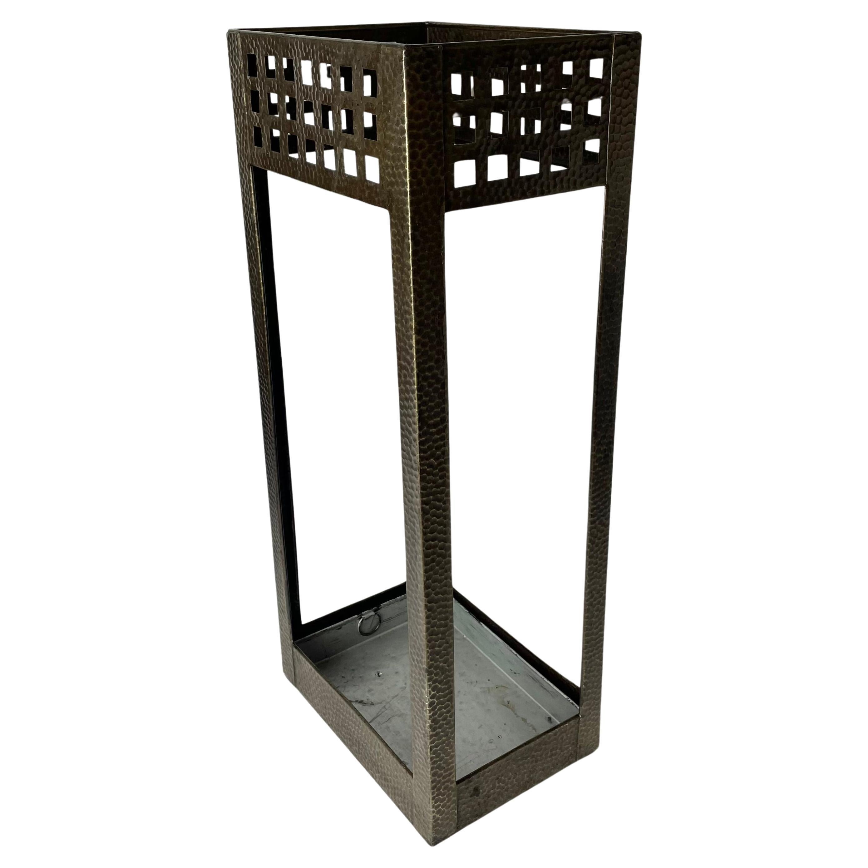 Elegant Umbrella Stand in hammered iron from the early 20th Century For Sale