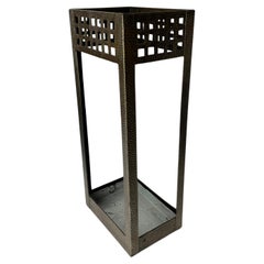 Elegant Umbrella Stand in hammered iron from the early 20th Century