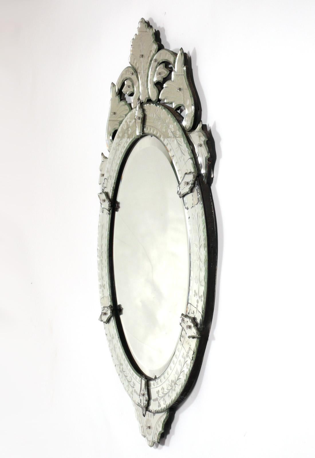 Elegant Venetian Oval Mirror, Italy, circa 1970s. It measures 43.25