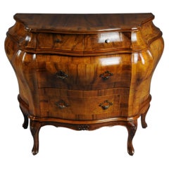 Elegant Venetian walnut bombé chest of drawers from the mid-20th century.