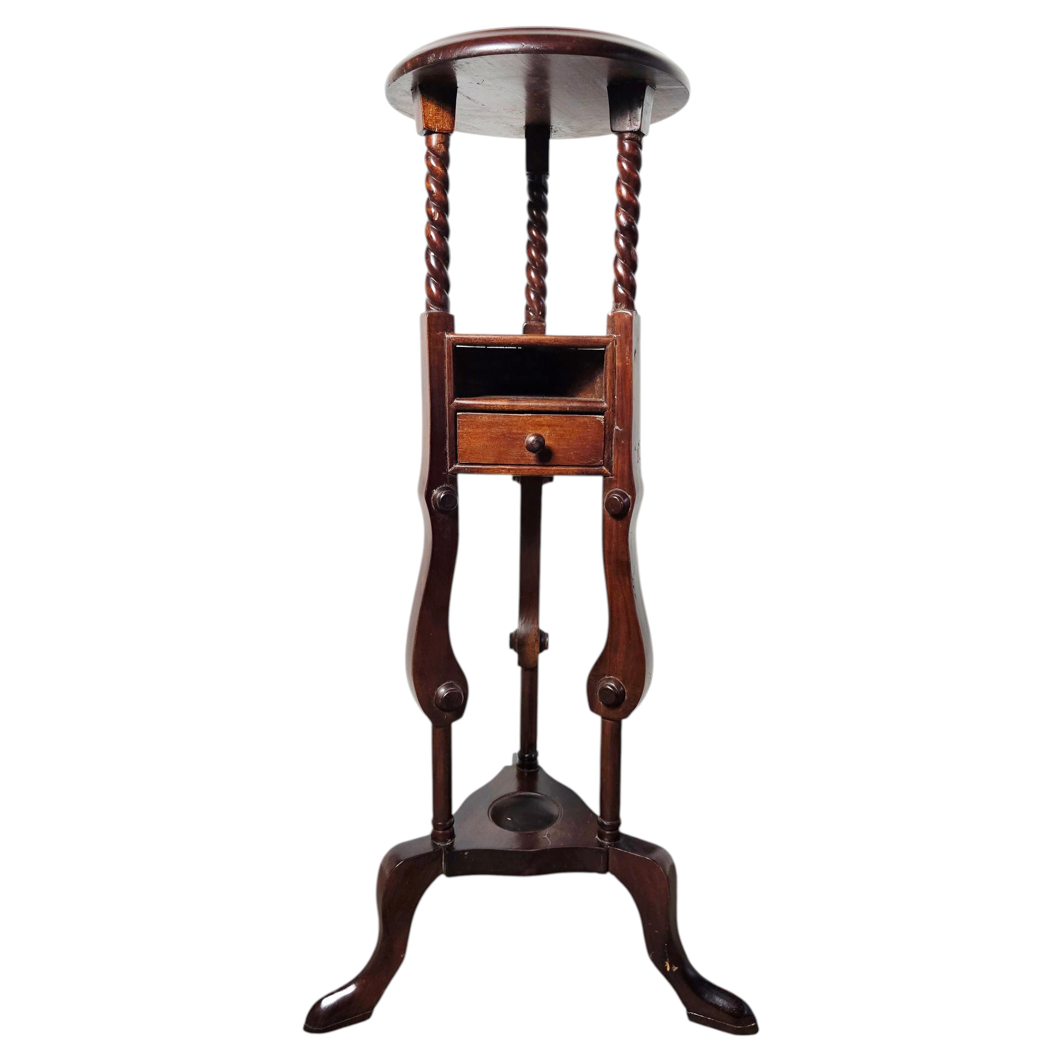 What is a Victorian plant stand called?