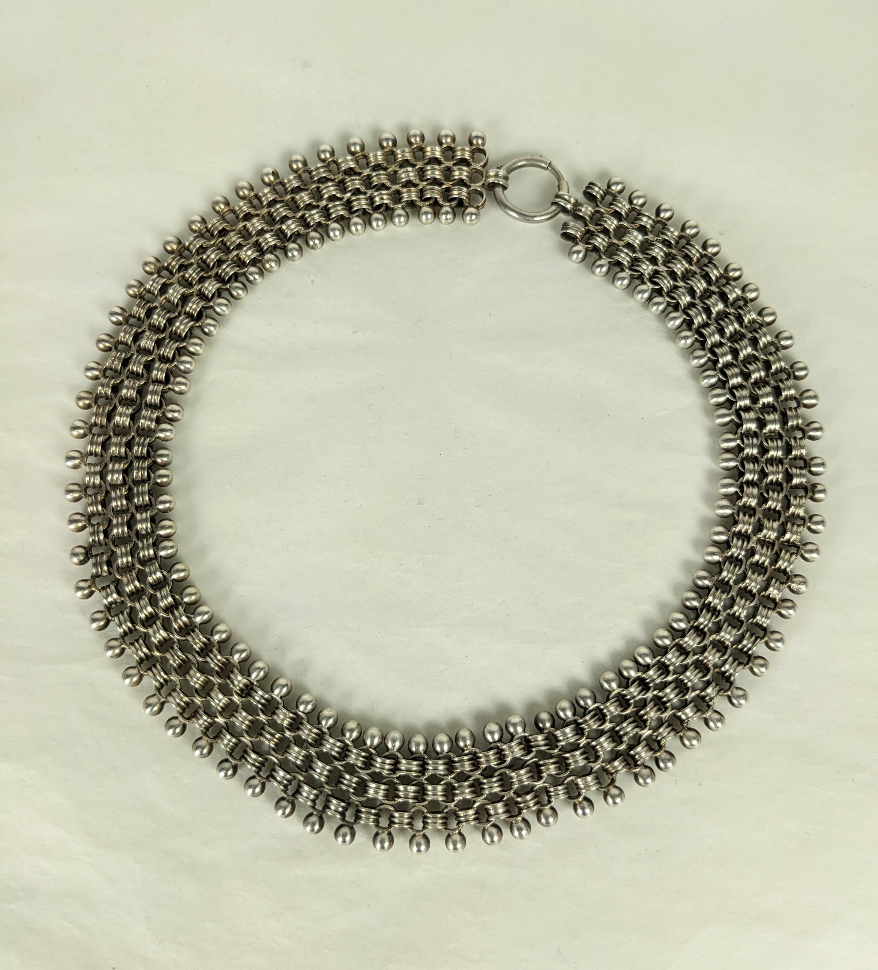 Elegant Victorian Silver Mesh Link Necklace from the late 19th Century. Flexible hand made links with ball trim with large original clasp. 
1880's. 17