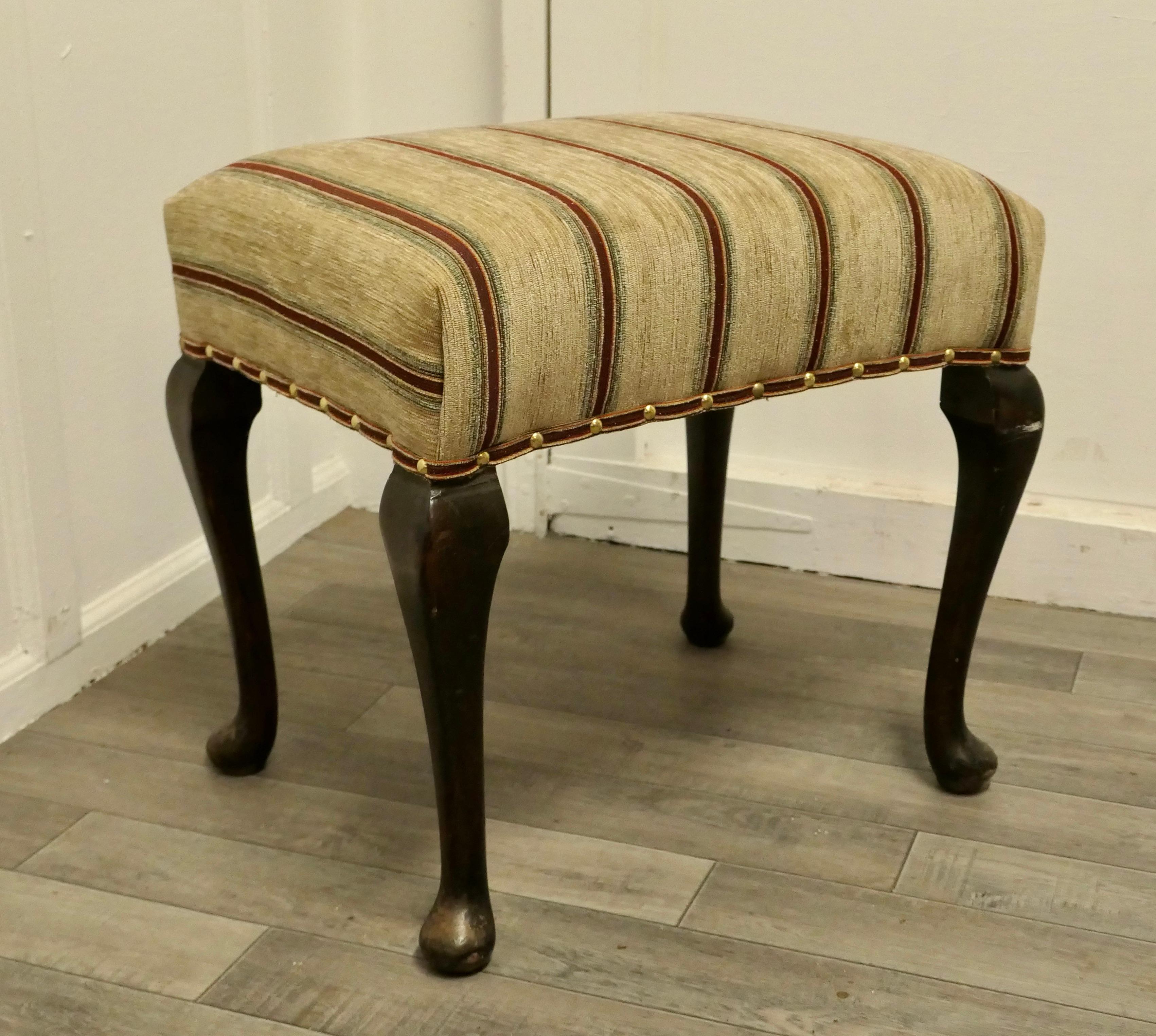 Elegant Victorian walnut occasional stool.

This is a lovely quality stool is made in walnut and set on cabriole legs, it is newly upholstered with an extra thick Heavyweight Regency Striped Chenille Fabric
This is a good sturdy stool with new