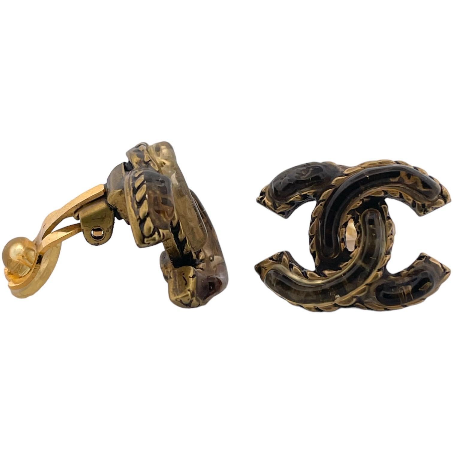 Elevate your jewelry collection with these certified authentic vintage Chanel clip-on earrings, crafted in radiant yellow gold. Each piece, embodying Chanel's iconic elegance, comes in the original box, adding an extra layer of luxury and