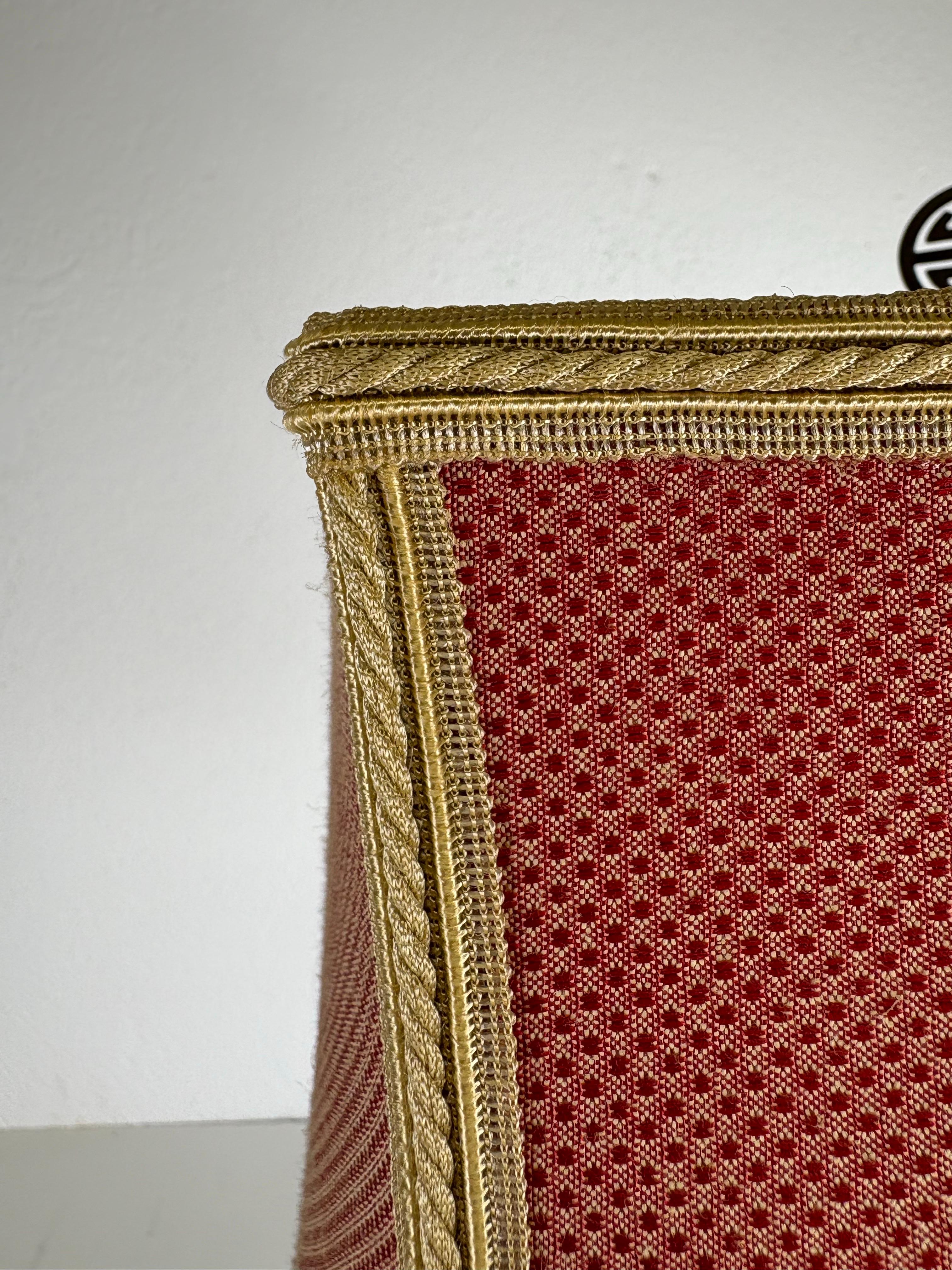 This is a hand painted vintage Chinese export pottery table lamp. This table lamp features beautiful hand painted figurative and floral decoration around the entire surface of the pottery with a dark walnut base. The lamp features a handmade square