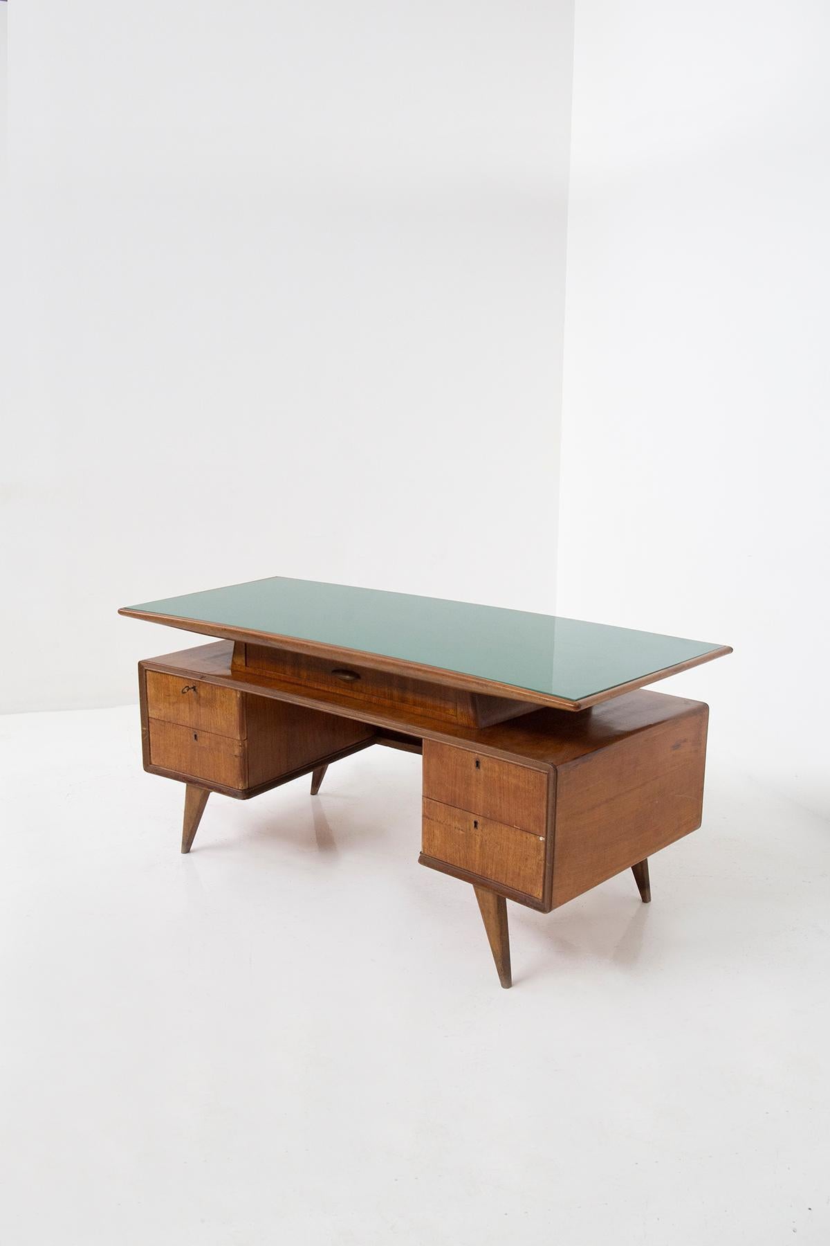 Transport yourself to the enchanting world of 1950s Italian design, where elegance and craftsmanship merged seamlessly. In the heart of this era's creative fervor, you'll discover a vintage Italian desk that's nothing short of a masterpiece, a