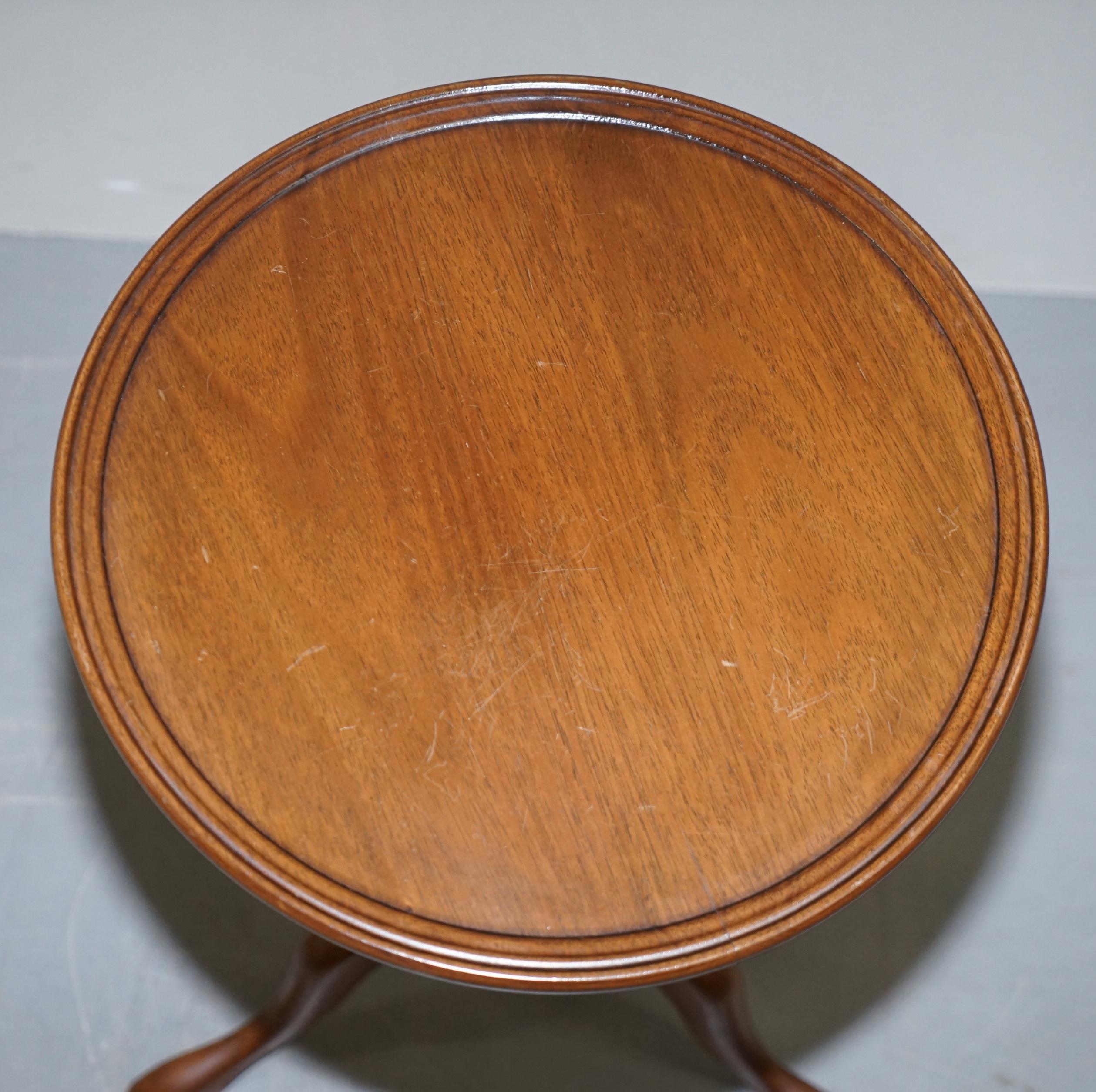 We are delighted to offer for sale this vintage mahogany lamp or side table with nicely turned column base

A good looking well made tripod, we have cleaned waxed and polished it from top to bottom, there will be normal patina marks from honest