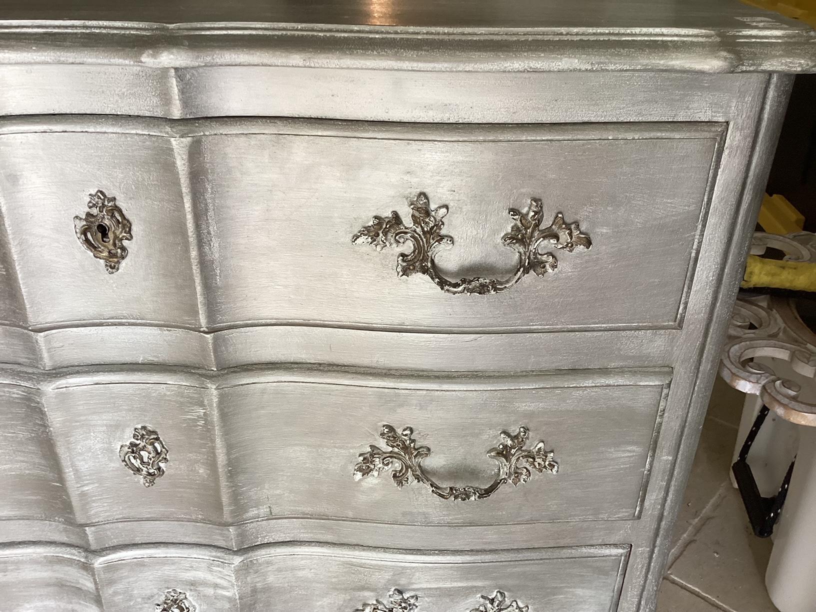 french style silver chest of drawers
