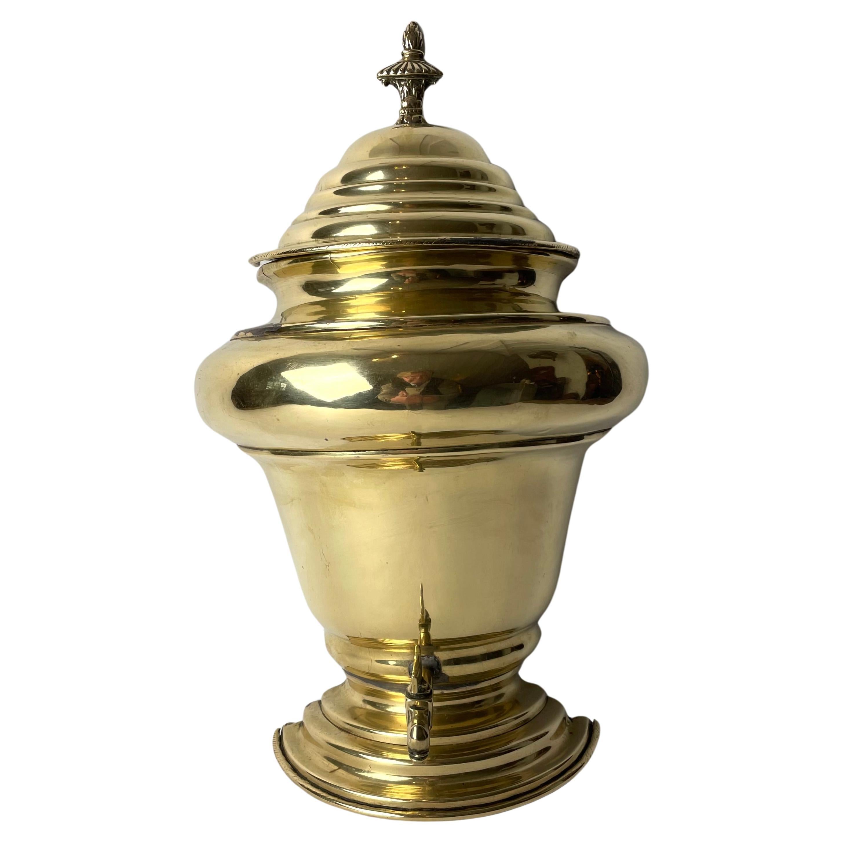 Elegant Water Cistern with tap for wall hanging in brass from early 19th Century For Sale