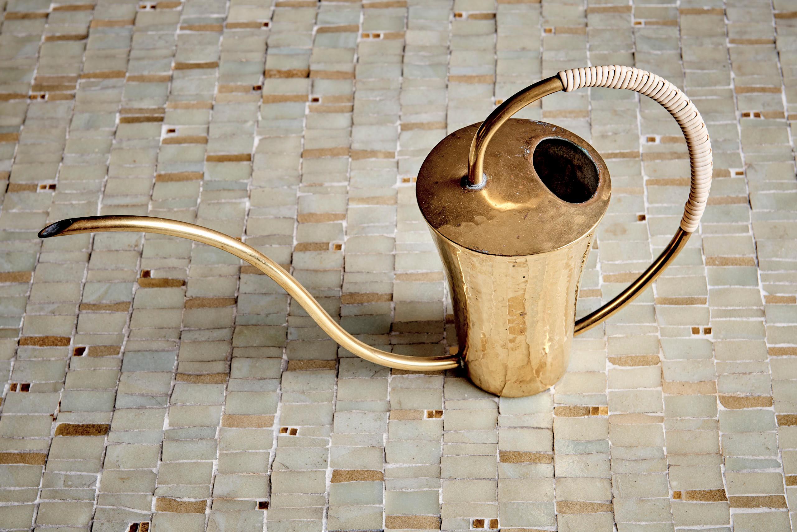 Mid-Century Modern Elegant Watering Can crafted from hammered brass For Sale