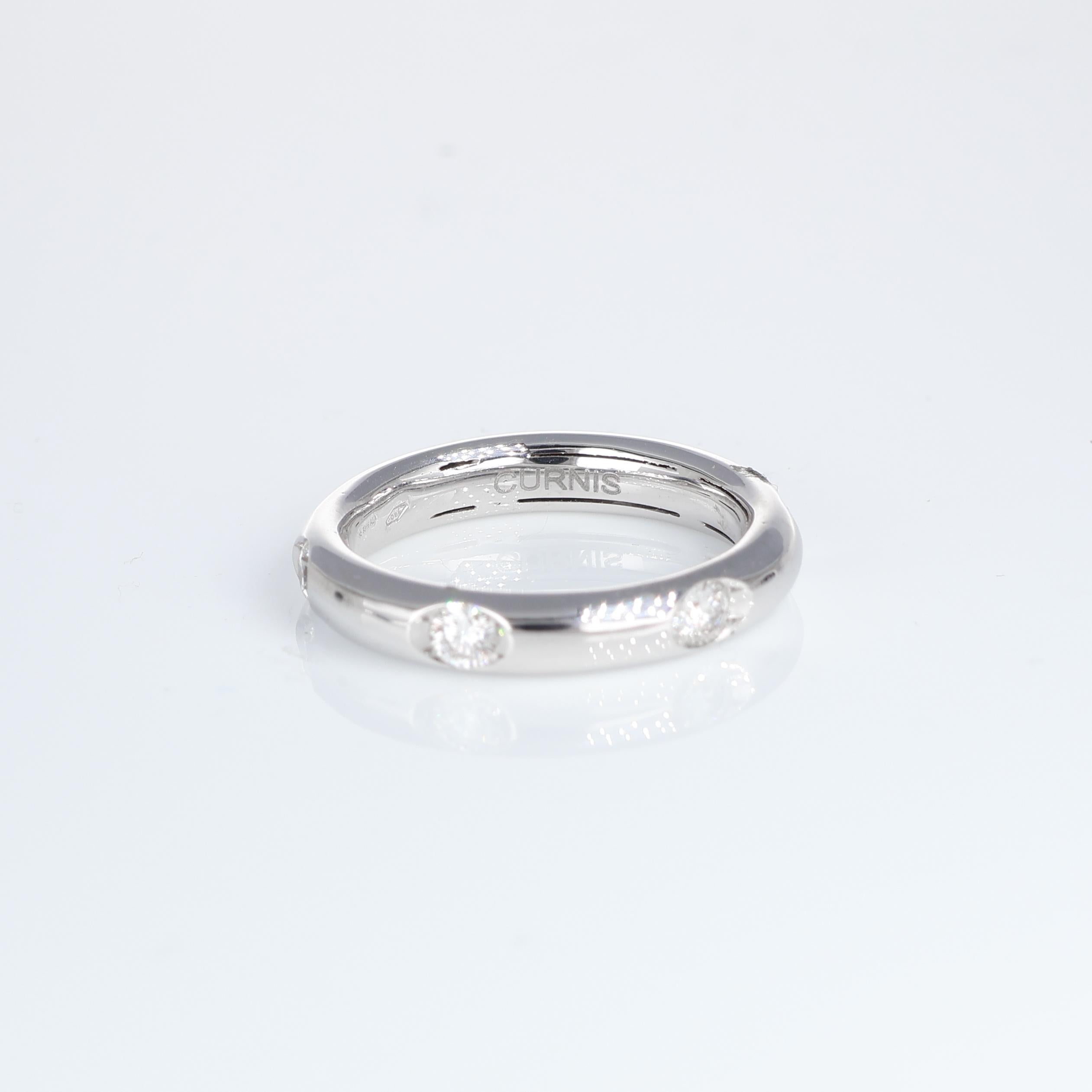 Brilliant Cut Elegant White Gold Band with Interspersed White Diamonds 0.62 carat For Sale