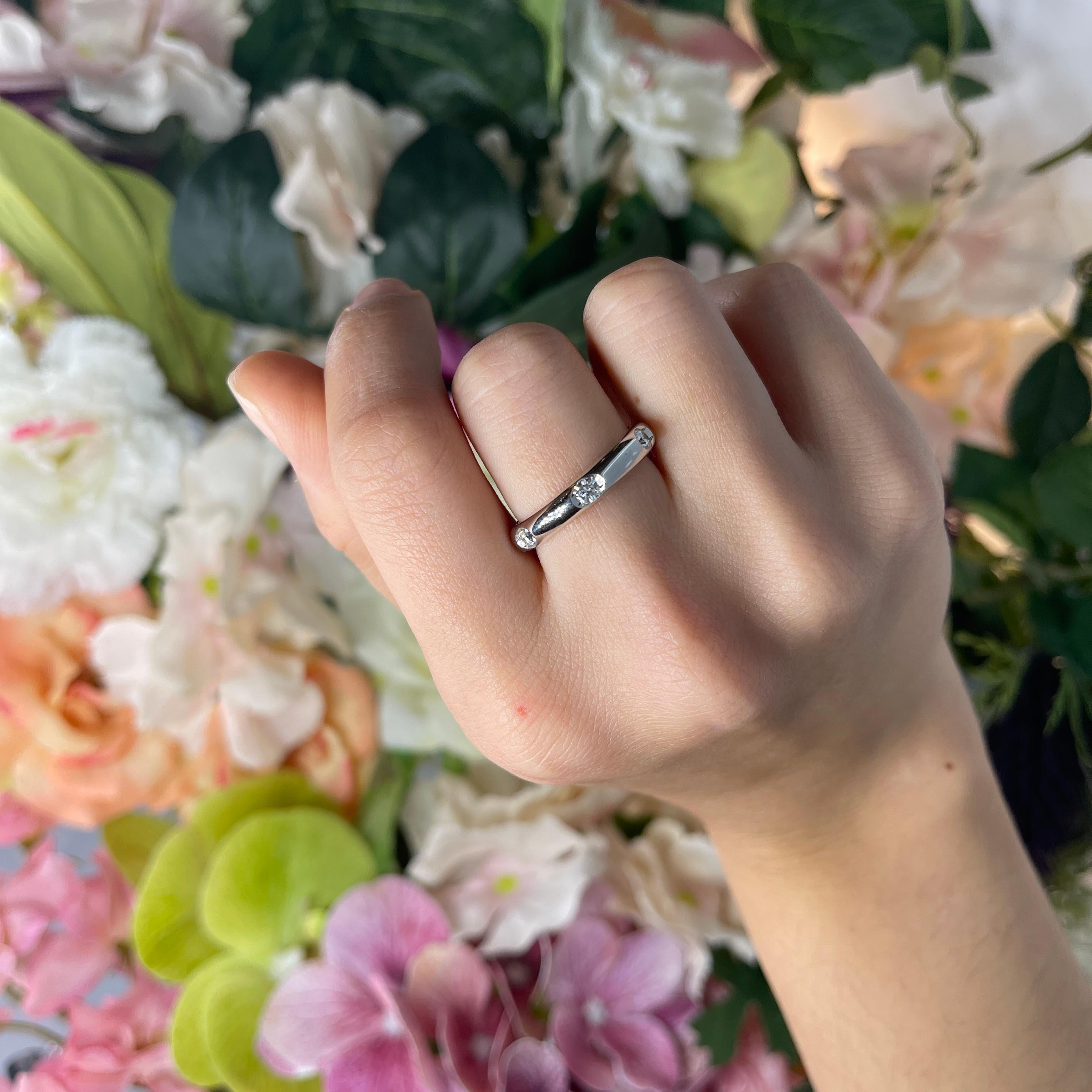 Elegant White Gold Band with Interspersed White Diamonds 0.62 carat For Sale 1