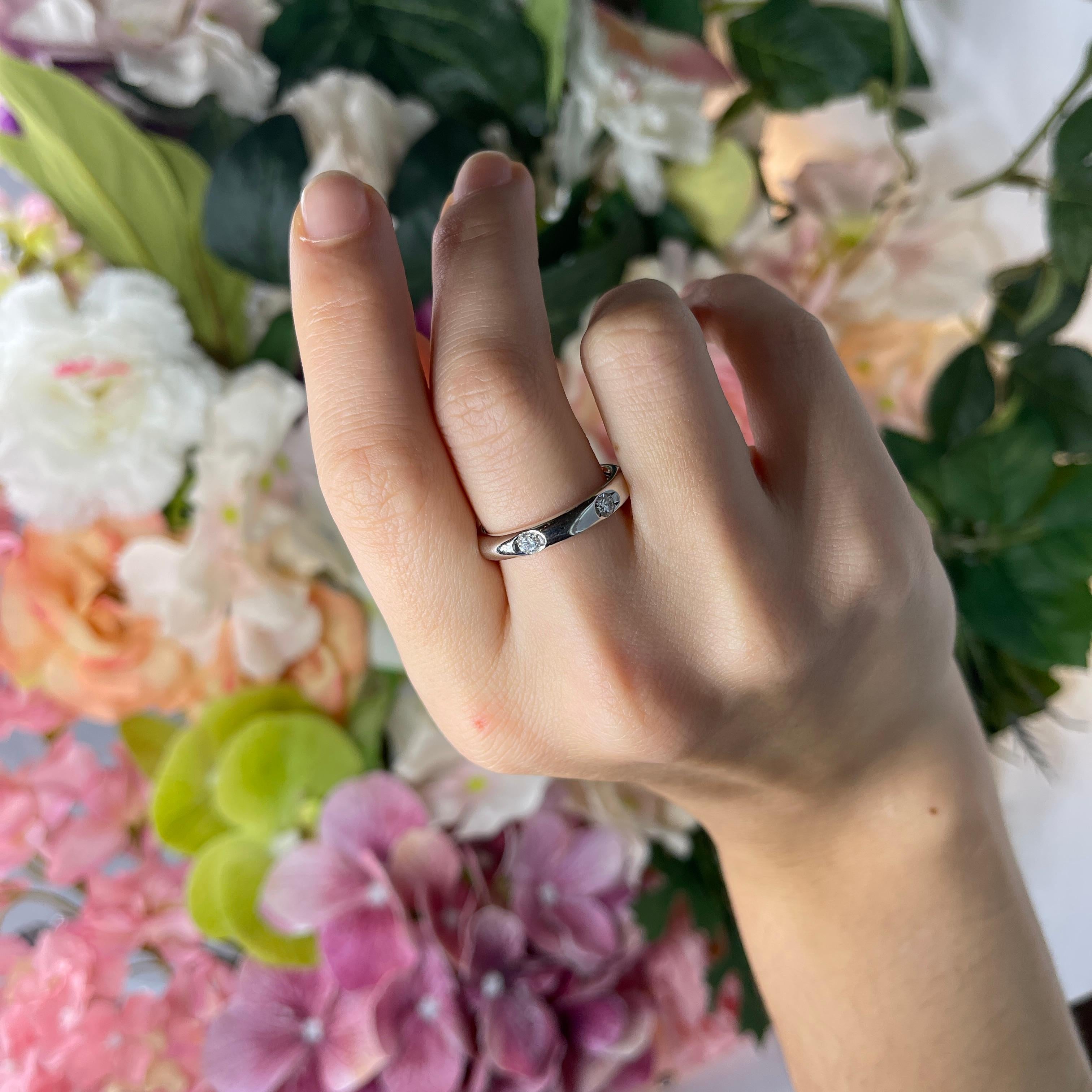 Elegant White Gold Band with Interspersed White Diamonds 0.62 carat For Sale 2