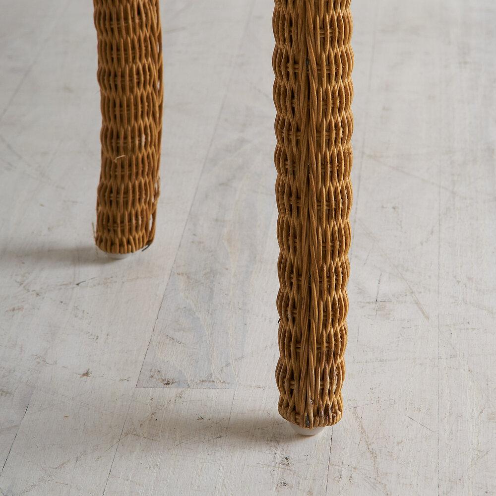 A vintage curved wicker console table in a perfectly petite size.

Dimensions: 27