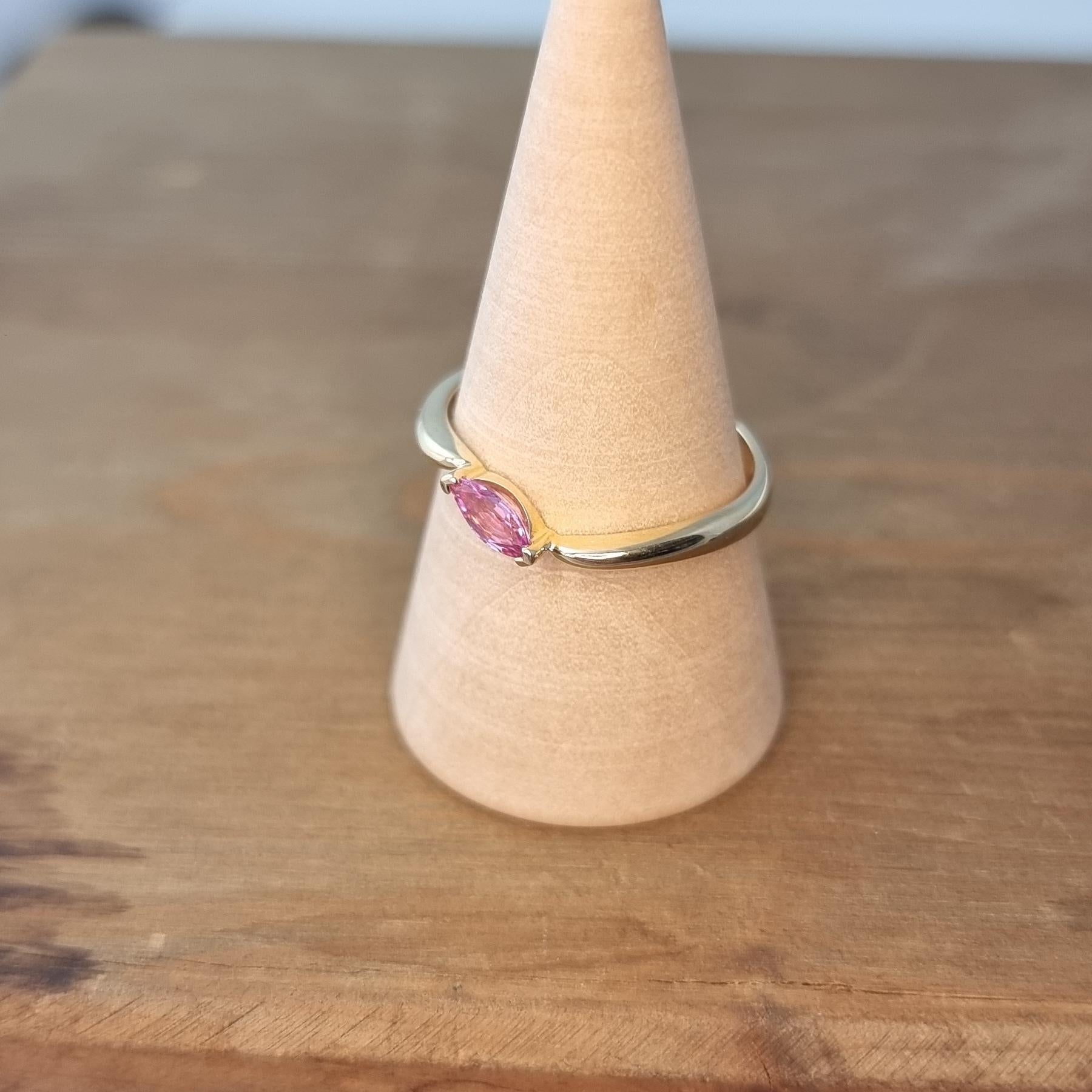 Women's Elegant Yellow Gold Ring with a Single Pink Sapphire in Marquise Cut For Sale