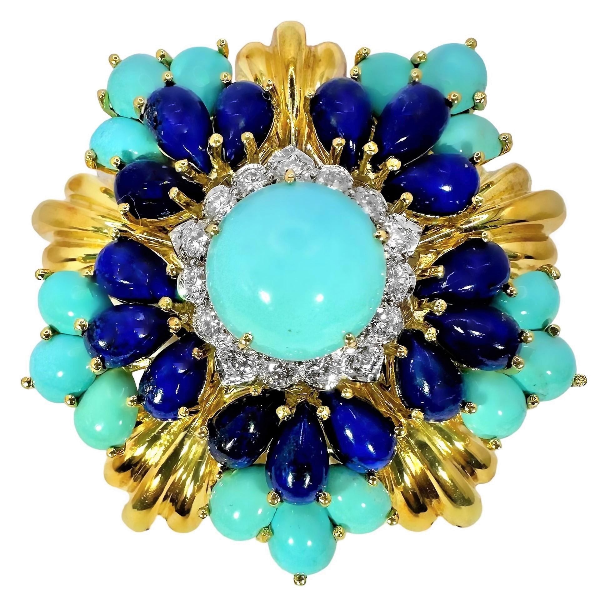 This wonderful Mid-20th Century 18k yellow gold pendant was created by highly regarded American manufacturer Montclair. It is in the style of a radiant flower with diamonds, fine turquoise, and lapis-lazuli. Total approximate diamond weight is