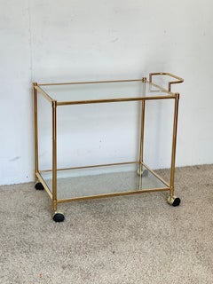 Elegant gold-plated brass cart with glass shelves, "Crystal & Gol," 1970