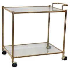 Elegant gold-plated brass cart with glass shelves, "Crystal & Gol," 1970