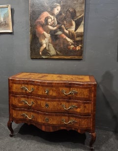 18th century Emilian chest of drawers in walnut and olive wood