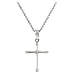 Elegante ciondolo a forma di croce in oro 18K