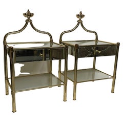Elegant pair of bedside tables in 24-karat gold-plated brass. 