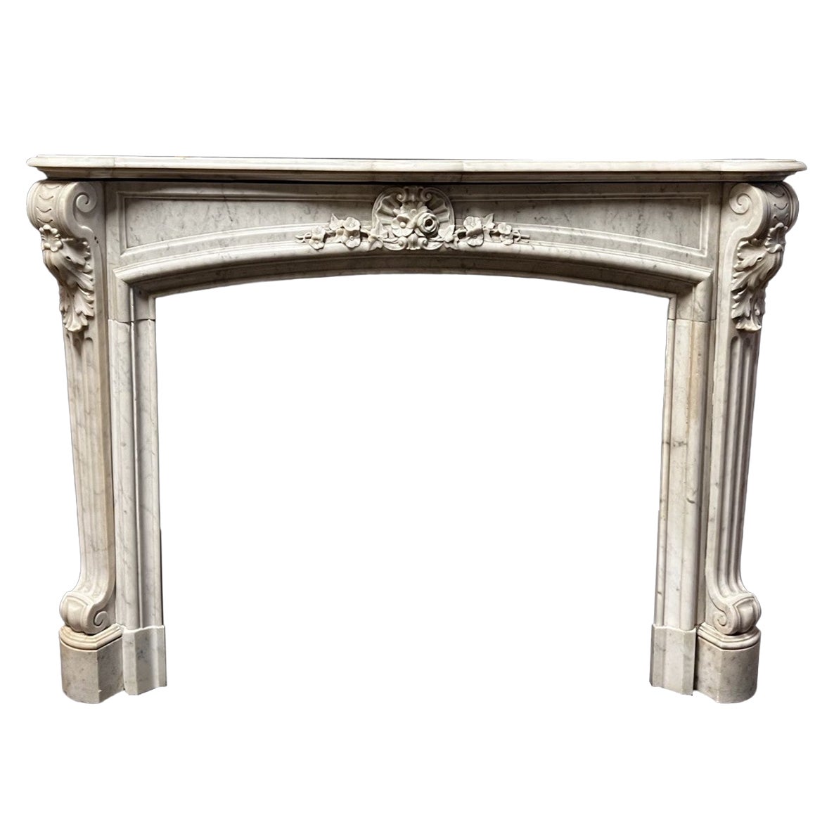 Elegant French fireplace frame in white veined marble, France