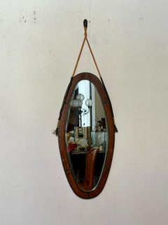 Elegant oval glass and wood mirror "Eleganza Nautica," 1970s