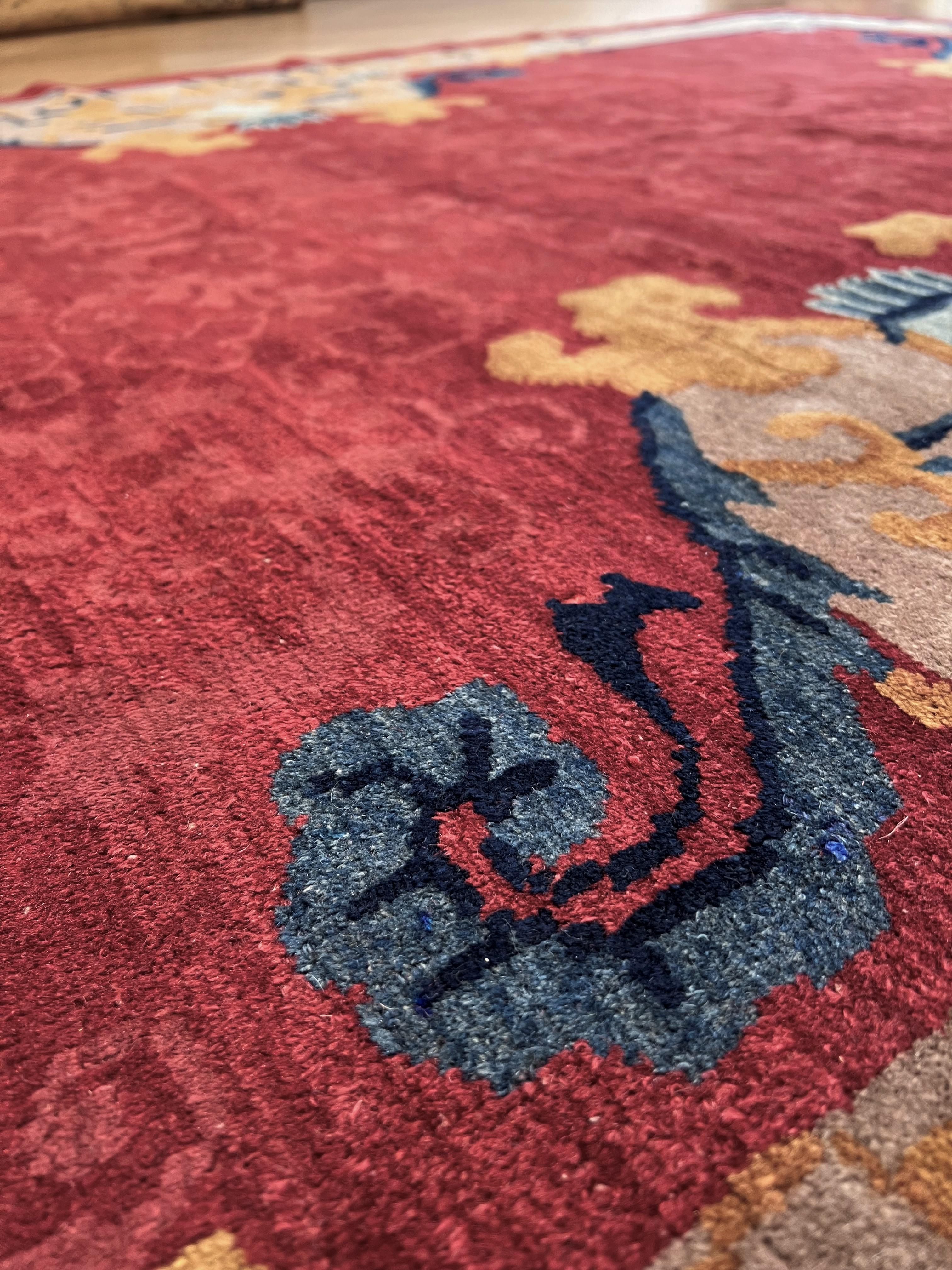 Wool Elegant Chinese carpet from the Art Nouveau period with a cerise red background For Sale