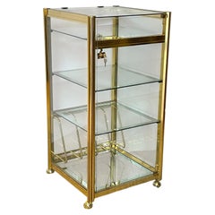 Elegant display cabinet with a brass and glass frame, "Regency Gold," 1970s
