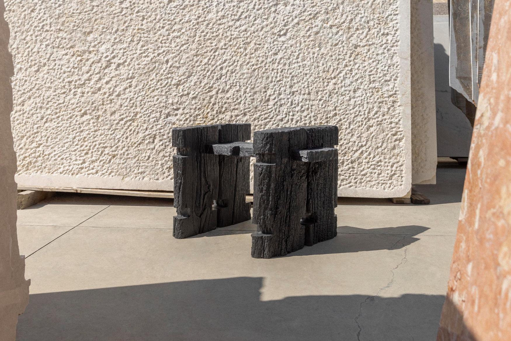 Element Black Bulk Stool by Nana Zaalishvili
Dimensions: W 85 x D 50 x H 55 cm
Materials: Textured and Painted Wood

‘Element’, which combines furniture of different functions, was created under the influence of the Georgian Oda house and the
